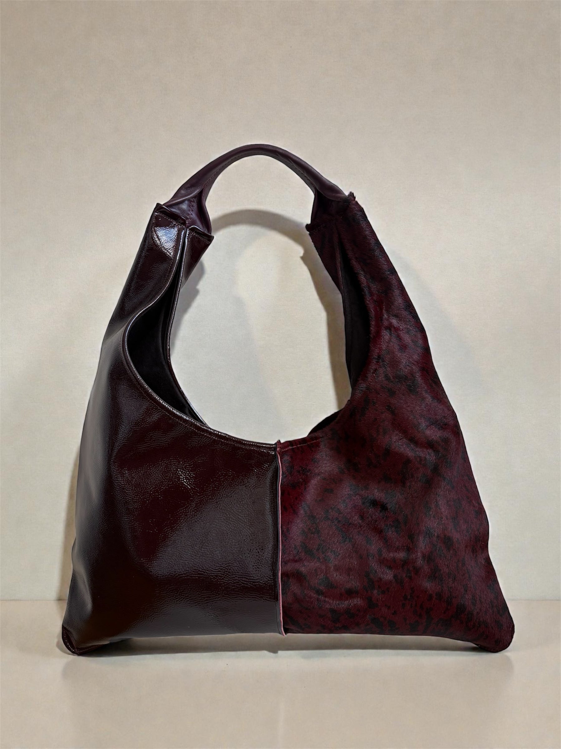 Borsa “Reborn” pelle lucida bordeaux & cavallino maculato bordeaux
