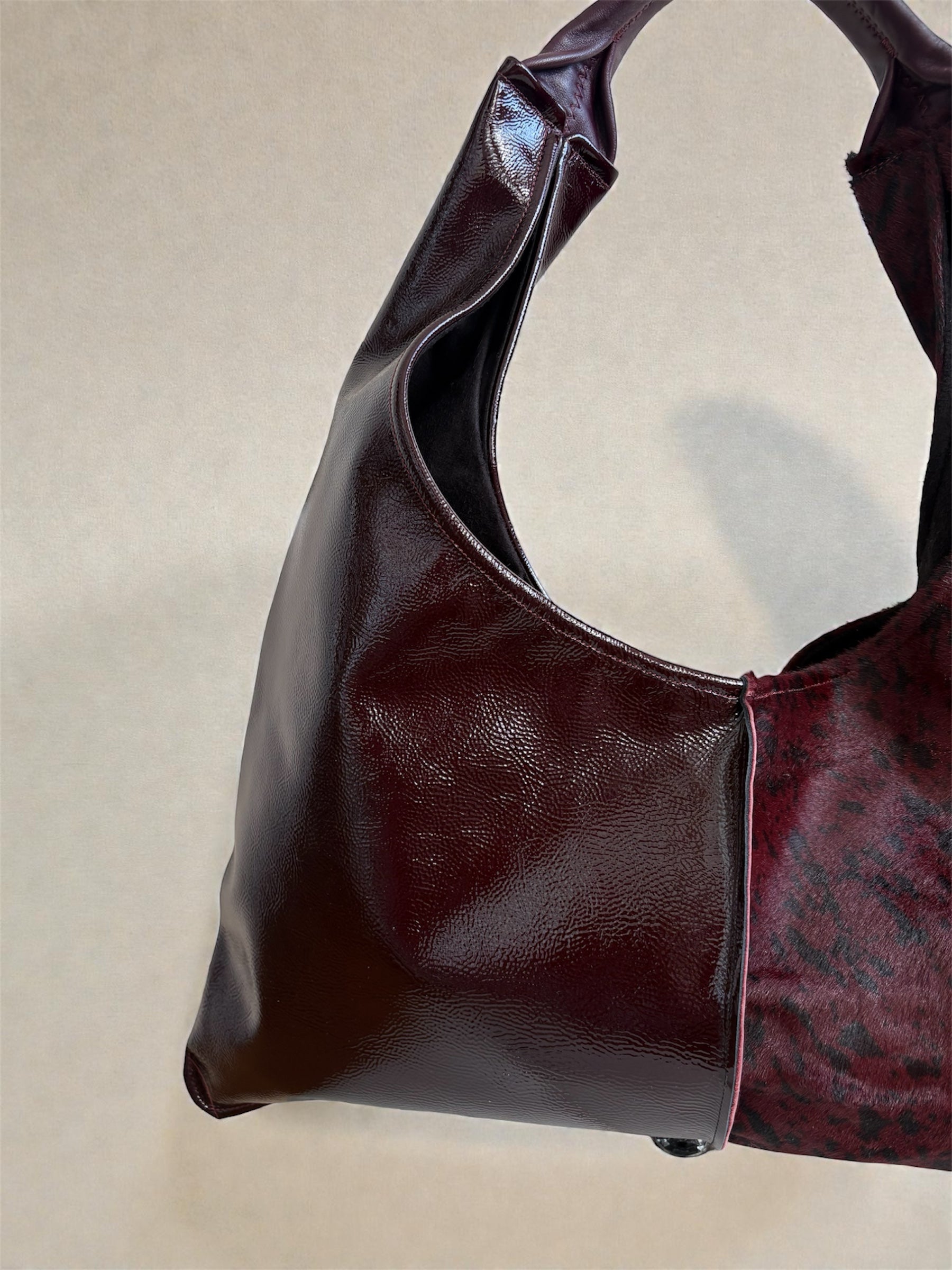 Borsa “Reborn” pelle lucida bordeaux & cavallino maculato bordeaux
