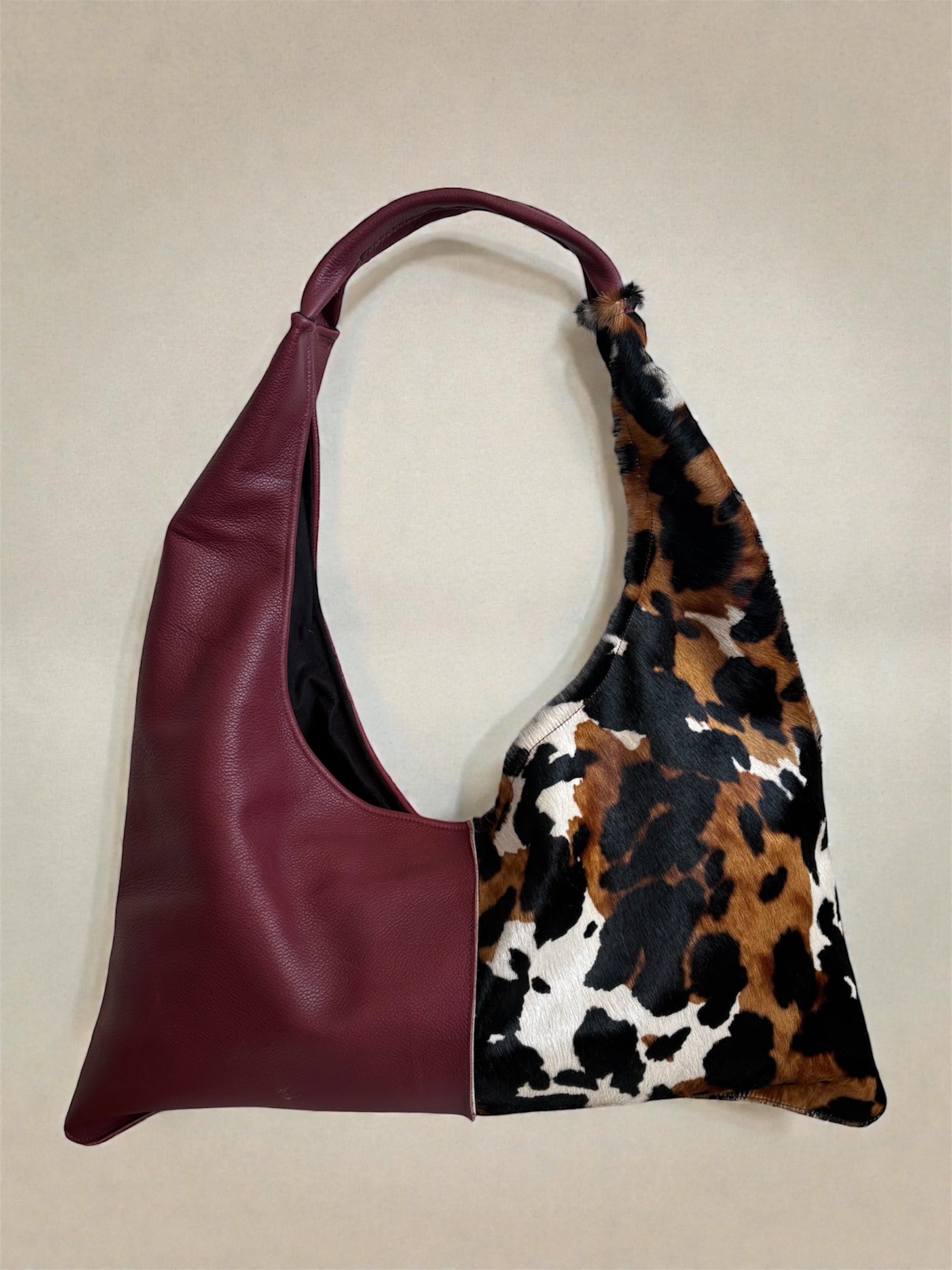 Borsa “Reborn” pelle bordeaux martellata & cavallino muccato