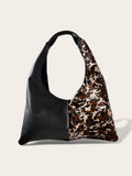 Borsa Reborn - pelle nera & cavallino muccato